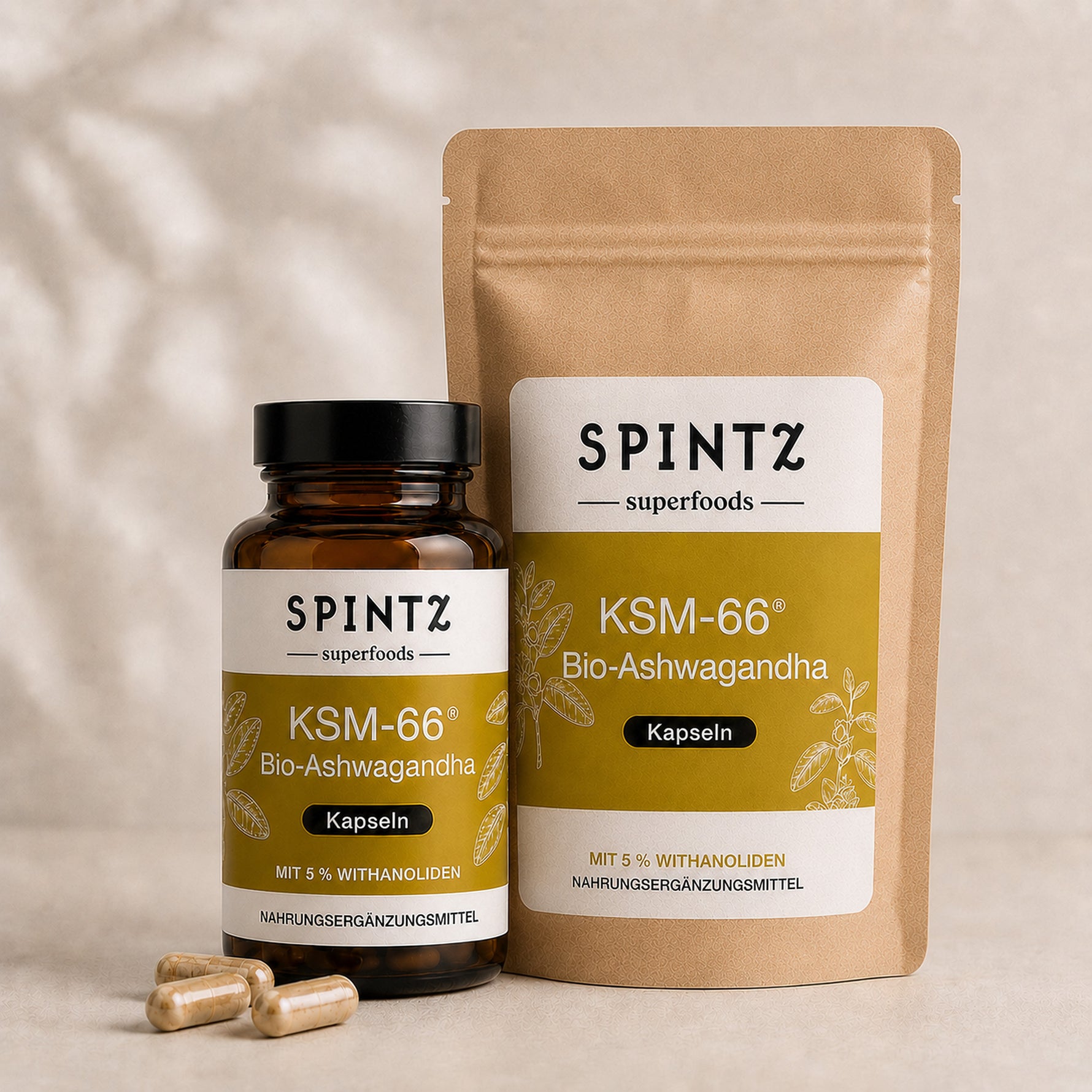 SPINTZ KSM-66 Bio-Ashwagandha Kapseln in Glas und Nachfüllbeutel vor natürlichem Hintergrund