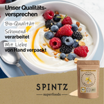 SPINTZ Bio Akazienfaser Pulver neben einer Schale mit Joghurt und Beeren