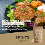 Ein Salatteller mit Gemüse-Patties: SPINTZ Rauchsalz bringt rauchig-würzigen BBQ-Geschmack in vegetarische und vegane Gerichte.